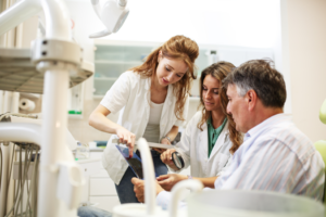 a group of dental assistants undergoing training